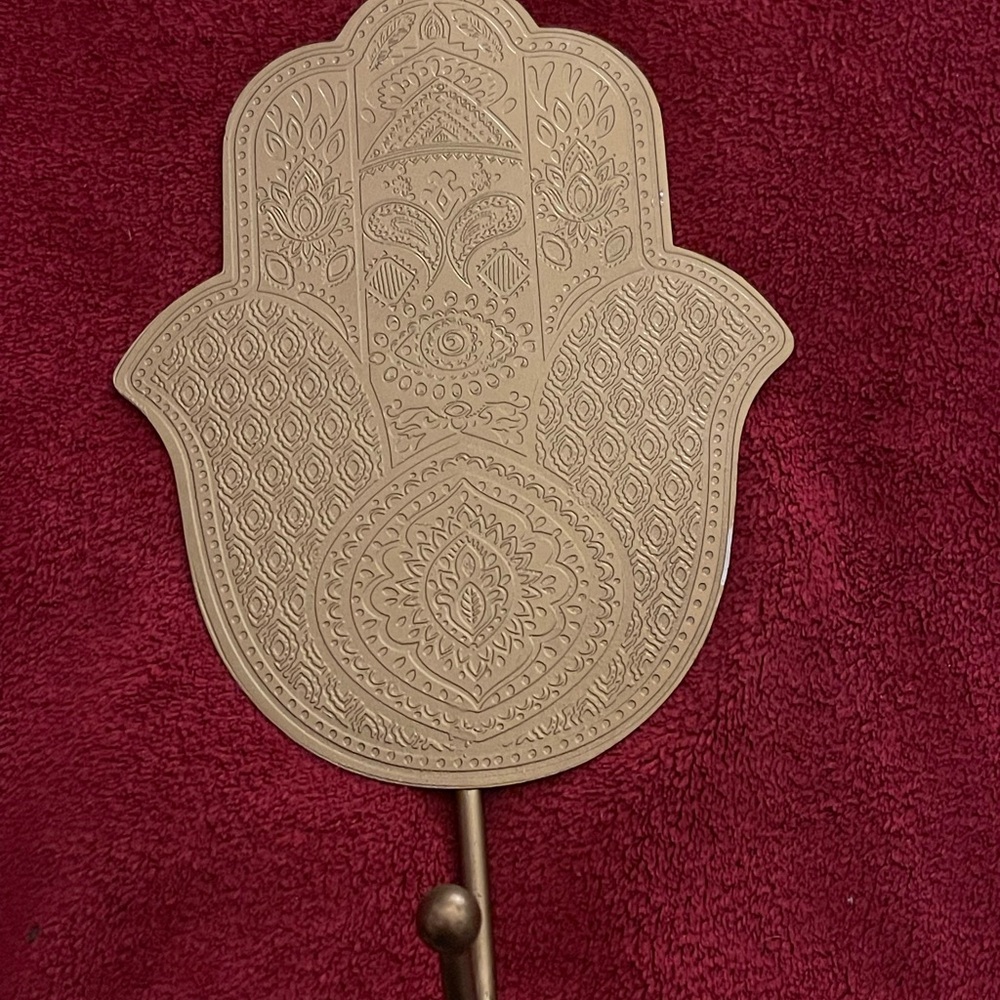 Palm coat hanger
